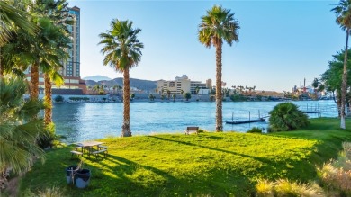 Experience riverfront living at its finest in this spacious