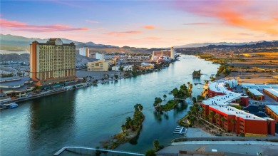 Experience riverfront living at its finest in this spacious