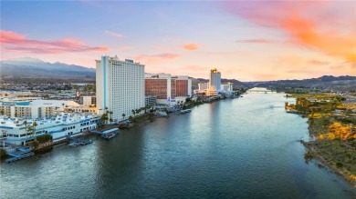 Experience riverfront living at its finest in this spacious