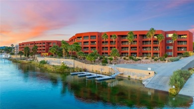 Experience riverfront living at its finest in this spacious