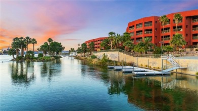 Experience riverfront living at its finest in this spacious