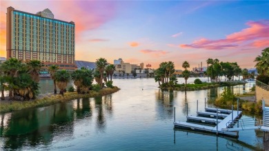 Experience riverfront living at its finest in this spacious