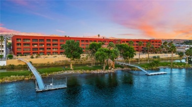 Experience riverfront living at its finest in this spacious