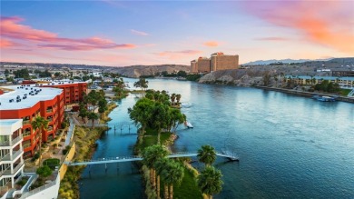 Experience riverfront living at its finest in this spacious