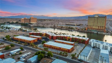 Experience riverfront living at its finest in this spacious