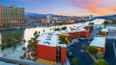 Experience riverfront living at its finest in this spacious