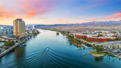 Experience riverfront living at its finest in this spacious