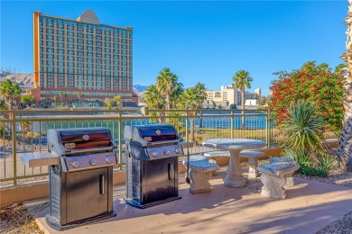 Experience riverfront living at its finest in this spacious