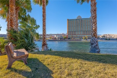 Experience riverfront living at its finest in this spacious