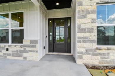 Welcome to 595 Buckskin Dr. in the gated coastal community of