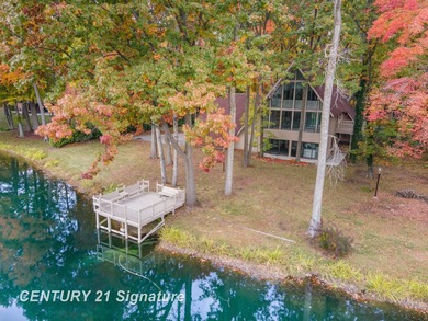 Welcome to 10363 Lakewood Dr., a beautiful and private retreat