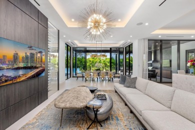 1955 Thatch Palm in Royal Palm Yacht & Country Club is a