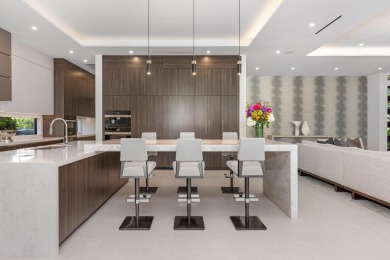 1955 Thatch Palm in Royal Palm Yacht & Country Club is a