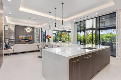 1955 Thatch Palm in Royal Palm Yacht & Country Club is a