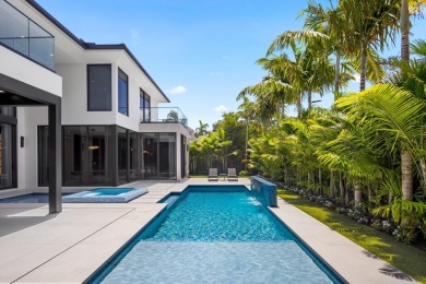 1955 Thatch Palm in Royal Palm Yacht & Country Club is a