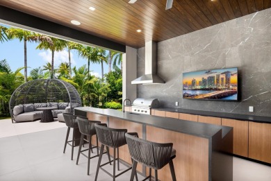 1955 Thatch Palm in Royal Palm Yacht & Country Club is a