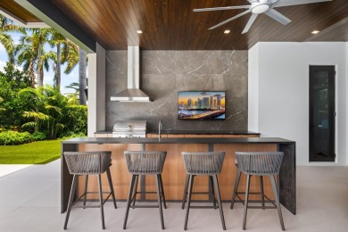 1955 Thatch Palm in Royal Palm Yacht & Country Club is a