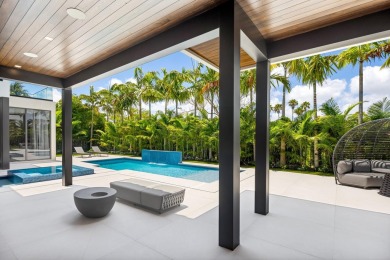 1955 Thatch Palm in Royal Palm Yacht & Country Club is a