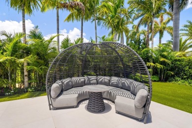 1955 Thatch Palm in Royal Palm Yacht & Country Club is a