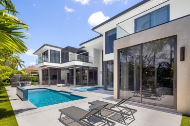 1955 Thatch Palm in Royal Palm Yacht & Country Club is a