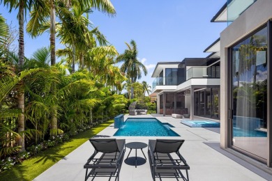 1955 Thatch Palm in Royal Palm Yacht & Country Club is a