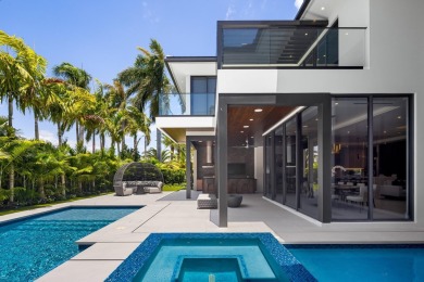 1955 Thatch Palm in Royal Palm Yacht & Country Club is a