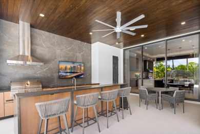 1955 Thatch Palm in Royal Palm Yacht & Country Club is a