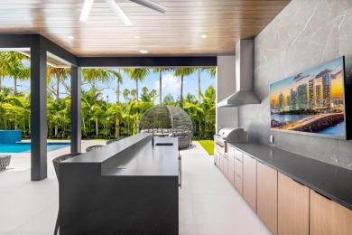 1955 Thatch Palm in Royal Palm Yacht & Country Club is a