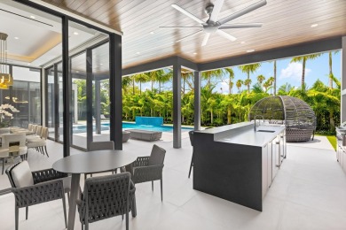 1955 Thatch Palm in Royal Palm Yacht & Country Club is a