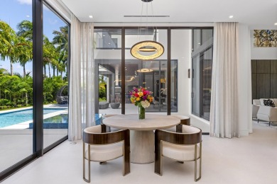 1955 Thatch Palm in Royal Palm Yacht & Country Club is a