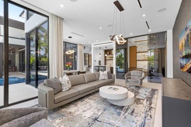 1955 Thatch Palm in Royal Palm Yacht & Country Club is a