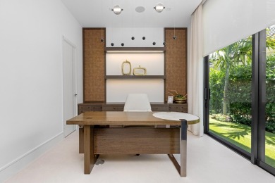 1955 Thatch Palm in Royal Palm Yacht & Country Club is a