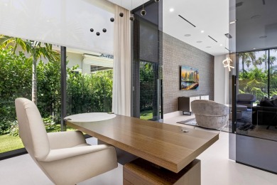 1955 Thatch Palm in Royal Palm Yacht & Country Club is a