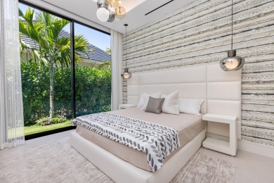 1955 Thatch Palm in Royal Palm Yacht & Country Club is a