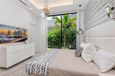 1955 Thatch Palm in Royal Palm Yacht & Country Club is a