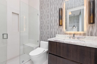 1955 Thatch Palm in Royal Palm Yacht & Country Club is a