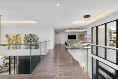 1955 Thatch Palm in Royal Palm Yacht & Country Club is a