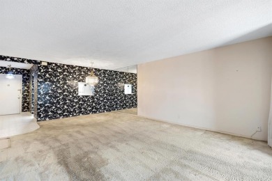 This spacious 2-bedroom, 2-bathroom condo offers a wonderful