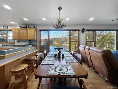 BEAUTIFUL, WELL-MAINTAINED HOME ON OSTRANDER LAKE! Welcome to