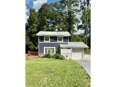 Beautifully and meticulously renovated, this 4-bedroom, 3-bath