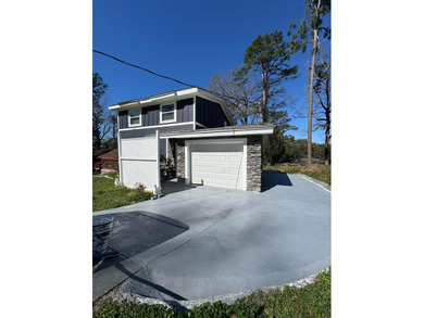 Beautifully and meticulously renovated, this 4-bedroom, 3-bath