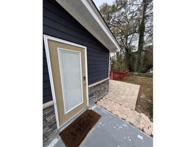 Beautifully and meticulously renovated, this 4-bedroom, 3-bath