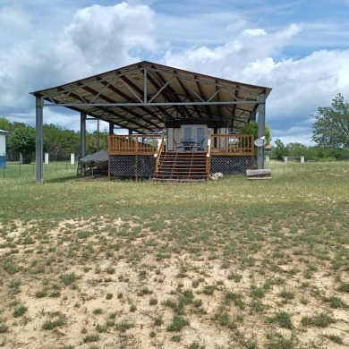 Lake front on Lake Medina with boat ramp and dock. Great views
