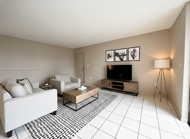 READY TO MOVE IN. This unit offers a charming and comfortable