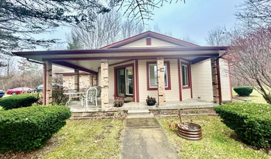 Nestled on a sprawling 6-acre parcel, this ranch-style home
