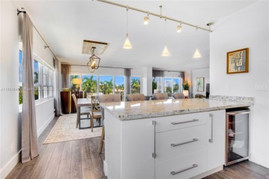 Corner unit unlike no other located right on Las Olas! Spacious