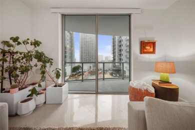 Upgraded 1 bedroom & 1 bath condo at 1060 Brickell. This home