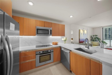 Upgraded 1 bedroom & 1 bath condo at 1060 Brickell. This home