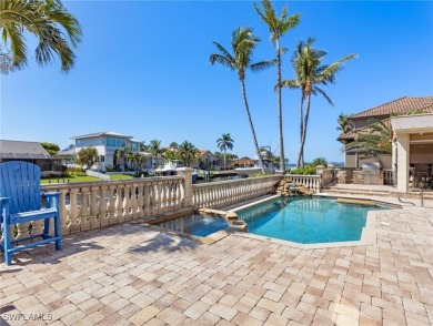 This two-story custom built home in highly desired Town and