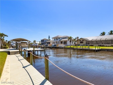 This two-story custom built home in highly desired Town and